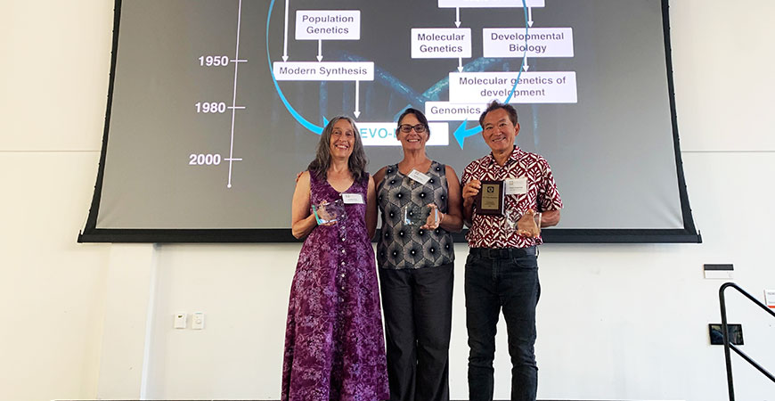 Professor Amemiya, right, with Past President Leslie Pick, left, and President Karen Crow.